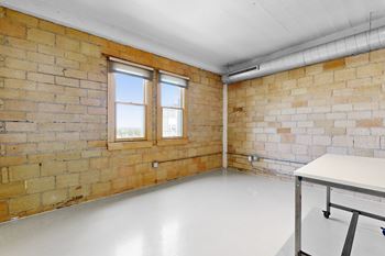 Exposed original brick and timber